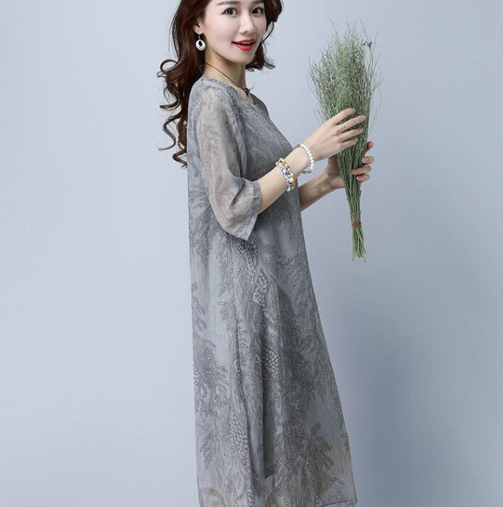 Big-sizes-woman-clothing-2018-Female-Large-Size-Dresses-Fancy-Printing-Half-Sleeve-slim-casual-Dress-32626082472